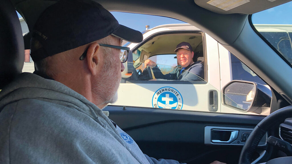 Nick Hamm talks to crew leader John Peters in Glace Bay, Nova Scotia, in October 2022. — John Longhurst/MDS