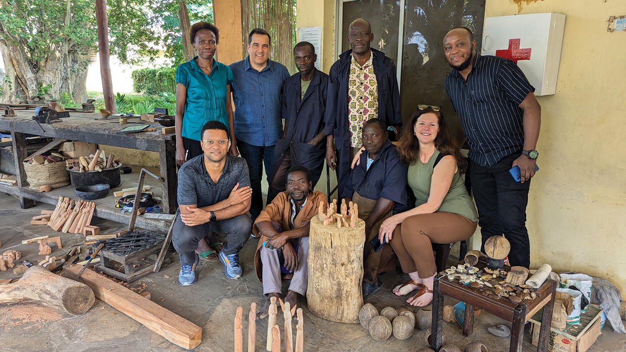Ten Thousand Villages staff meet workers at Bombolulu, an organization that provides employment and vocational training for artisans with disabilities in Mombasa, Kenya. — Ten Thousand Villages