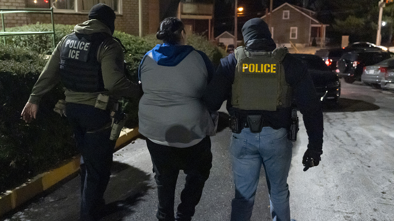 U.S. Immigration and Customs Enforcement officers detain a person Jan. 27, 2025, in Silver Spring, Md. — Alex Brandon/Associated Press