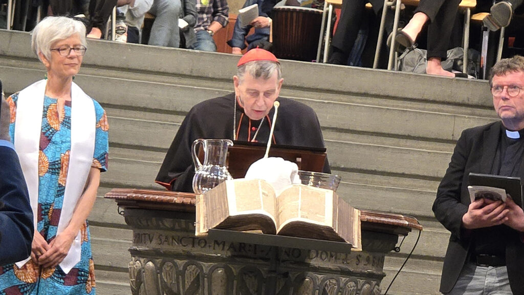 Cardinal Kurt Koch of the Dicastery for Promoting Christian Unity reads a message from Pope Leo XIV during the worship service celebrating the 500th anniversary of Anabaptism in Zurich, Switzerland, on May 29. — Dale D. Gehman for AW