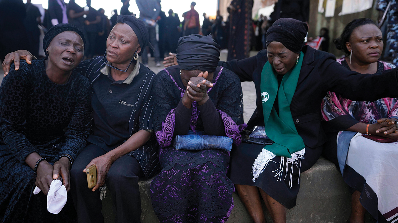 Women react during a march in solidarity with victims of an attack in Jos, Nigeria, on Jan. 6, 2024. — Sunday Alamba/AP
