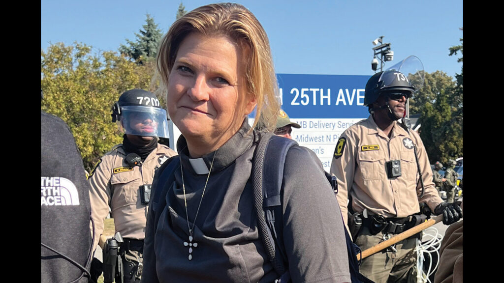 Kristin Loeks Jackson, pastor of Living Water Community Church, a member of Illinois Conference of Mennonite Church USA, outside the ICE processing facility in Broadview, Ill., Oct. 3. — Courtesy of Kristin Loeks Jackson
