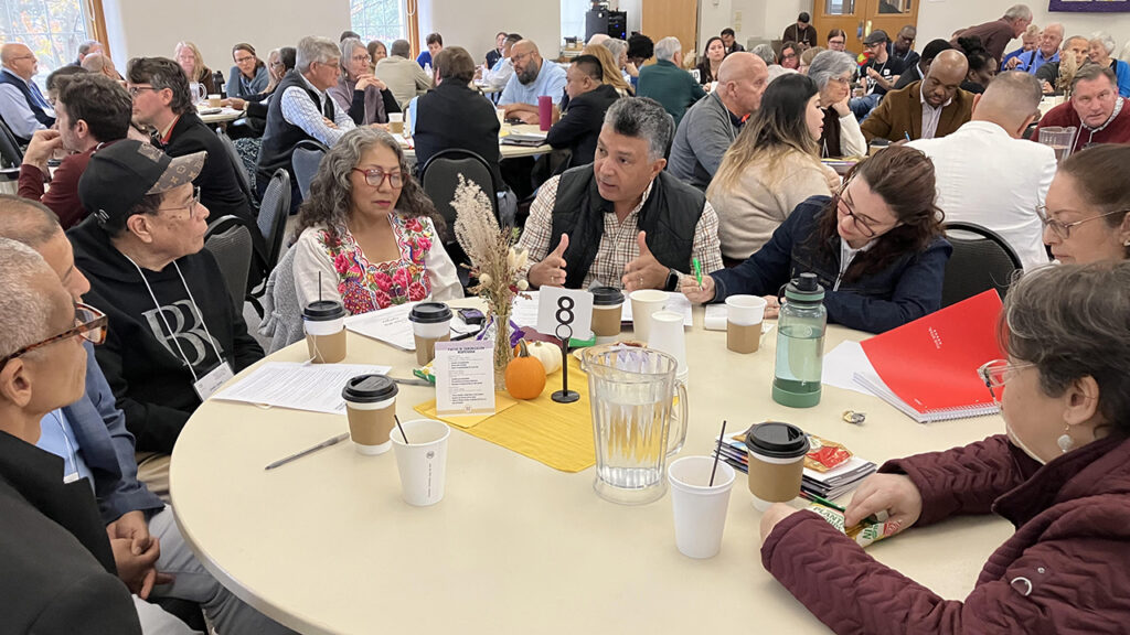 Mosaic Mennonite Conference delegates discuss the recommendation to end the conference’s membership in Mennonite Church USA at their annual assembly Nov. 1 at Souderton Mennonite Church in Pennsylvania. — Paul Schrag/AW