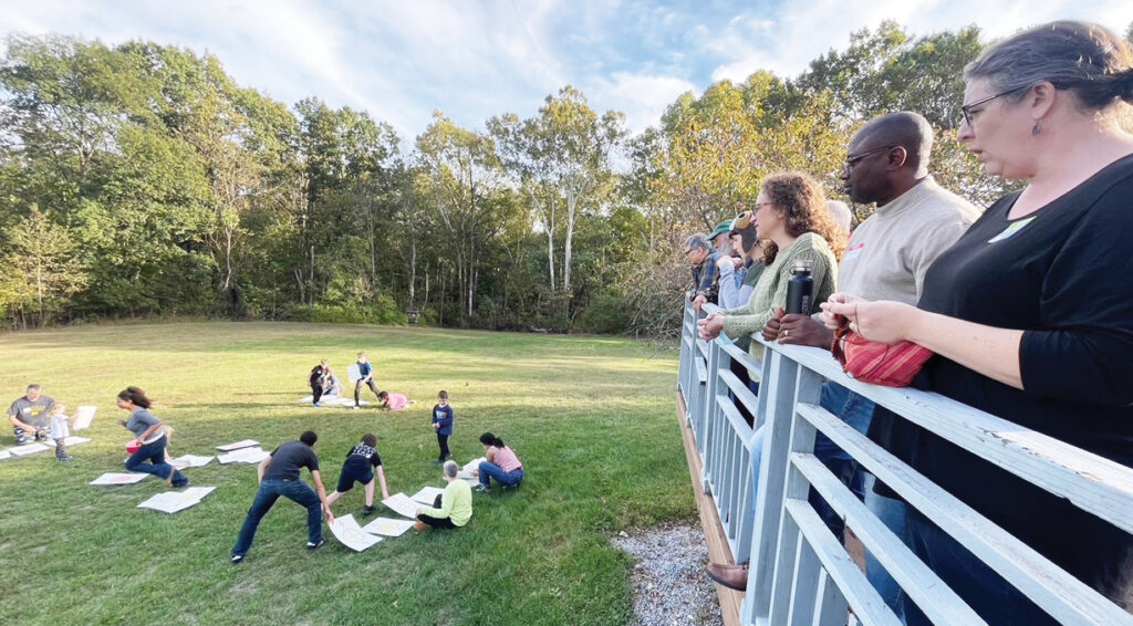 Hyattsville Mennonite Church folks play giant Dutch Blitz at a retreat in October. — Michelle Burkholder
