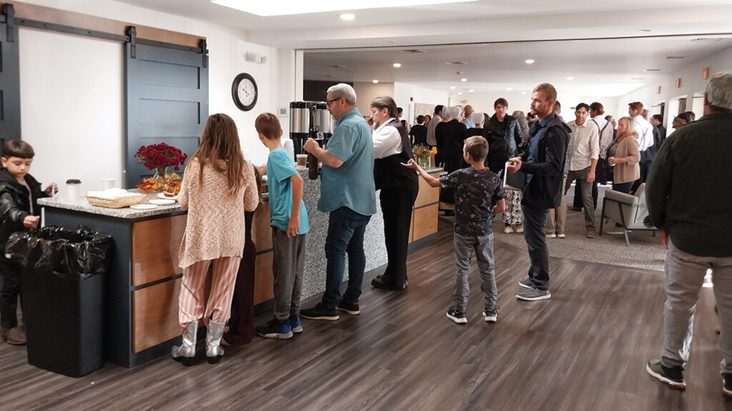 Members of Branch Community Church gather before Sunday morning worship Oct. 26. The Ridgeview and Branch congregations share a coffee hour in the lobby. — Eileen Kinch/AW