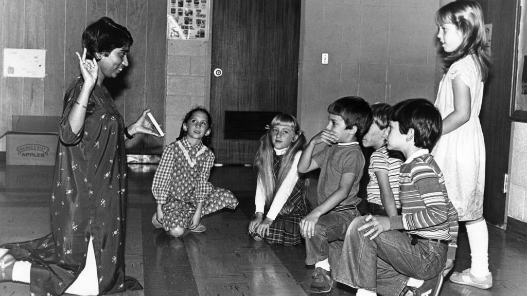 In 1984, Tabitha Thomas, an IVEP participant from India, taught third-grade children at Hinkletown Mennonite School in Lancaster County, Pa. Forty IVEP participants have served at the school. — Joy Hofer/MCC