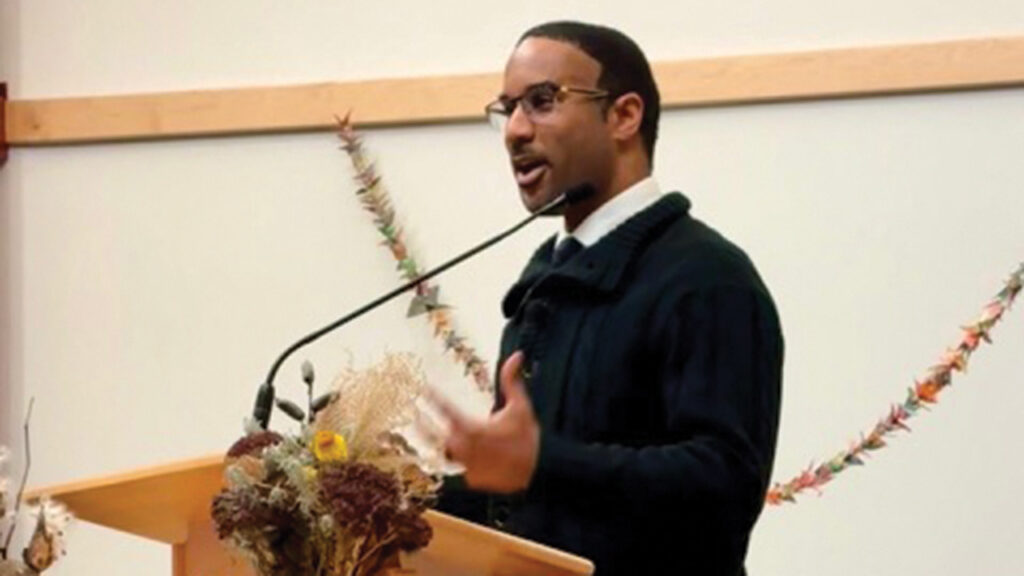 Drew G. I. Hart, associate professor of theology and program director for Thriving Together: Congregations for Racial Justice at Messiah University, speaks at the Reparations Summit on Nov. 15 at Assembly Mennonite Church in Goshen, Ind. — J Ron Byler