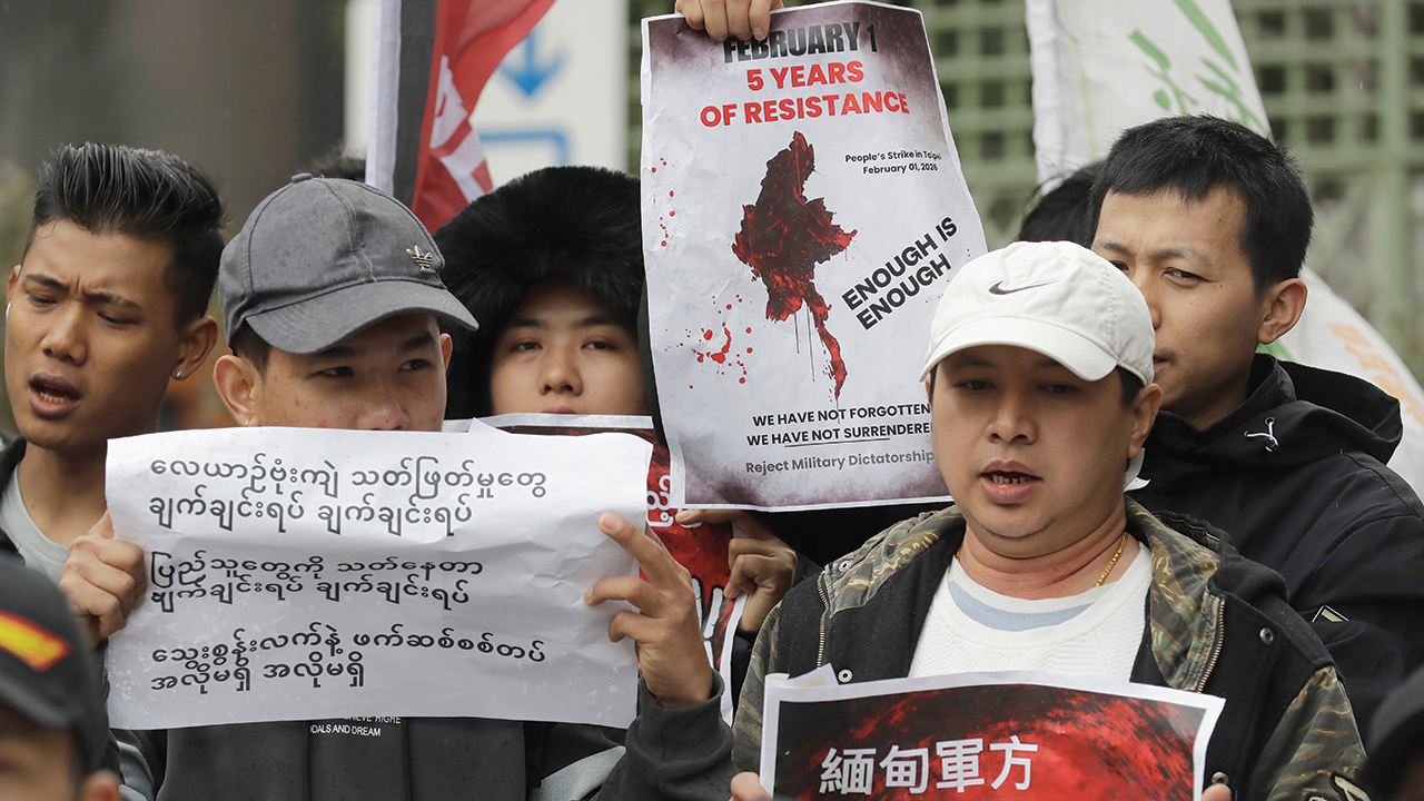 Myanmar nationals living in Taiwan and their supporters hold placards during a rally against Myanmar's military government, in New Taipei City, Taiwan, Feb. 1. — Chiang Ying-ying/AP