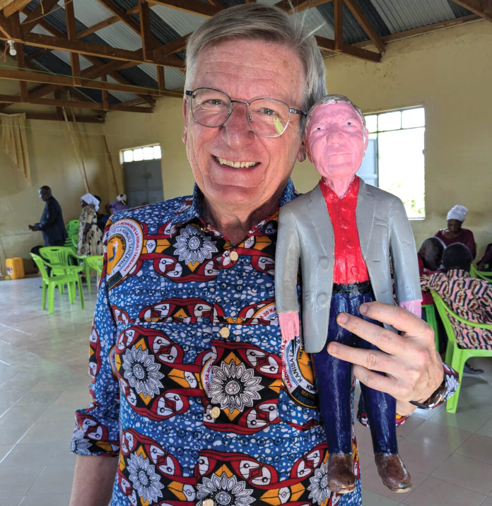 A local artist gave Mennonite World Conference President Henk Stenvers a carved image of himself. — Joe Bontrager