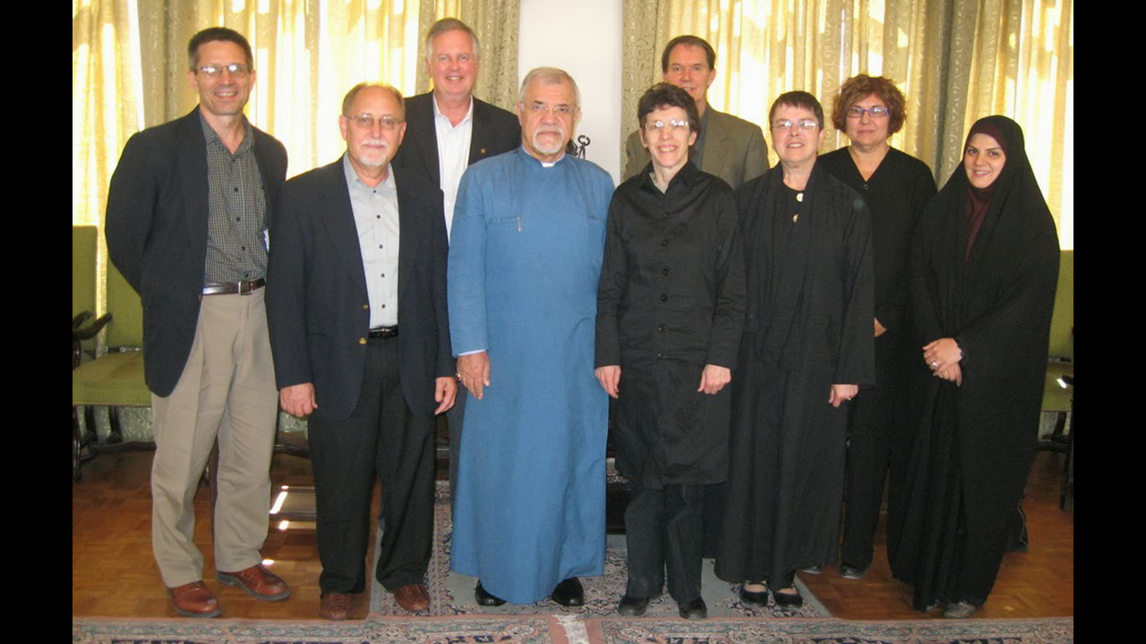 In 2008, a delegation of Mennonite educators traveled to Iran to explore exchanges with Iranian universities. From left are Daryl Byler of Mennonite Central Committee; Ted Koontz of Anabaptist Mennonite Biblical Seminary, Loren Swartzendruber of Eastern Mennonite University, Archbishop Sarkissian, Sally Summer Weaver of Bluffton University, Jim Pankratz of Conrad Grebel University College, Cindy Byler of MCC, Anita Stalter of Goshen College and an Iranian host. — Mennonite Central Committee