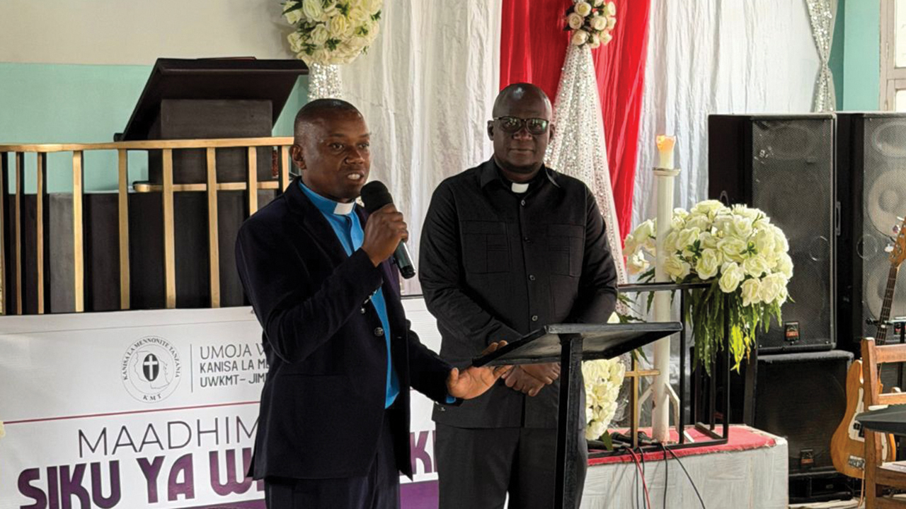 Evangelical Mennonite Church of Tanzania general secretary John M. Sean, left, and Tanzania Mennonite Church general secretary Emmanuel Hagai. — Liesa Unger/MWC