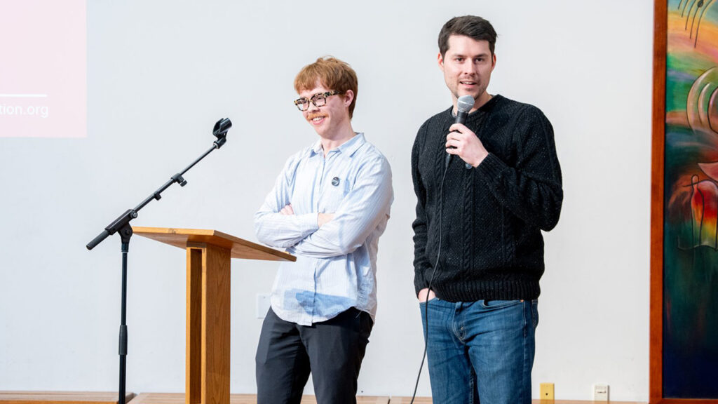 Adam Ramer and Nick Martin speak in February 2025 at the Intercollegiate Peace Fellowship conference at Eastern Mennonite University in Harrisonburg, Va. —Mennonite Action