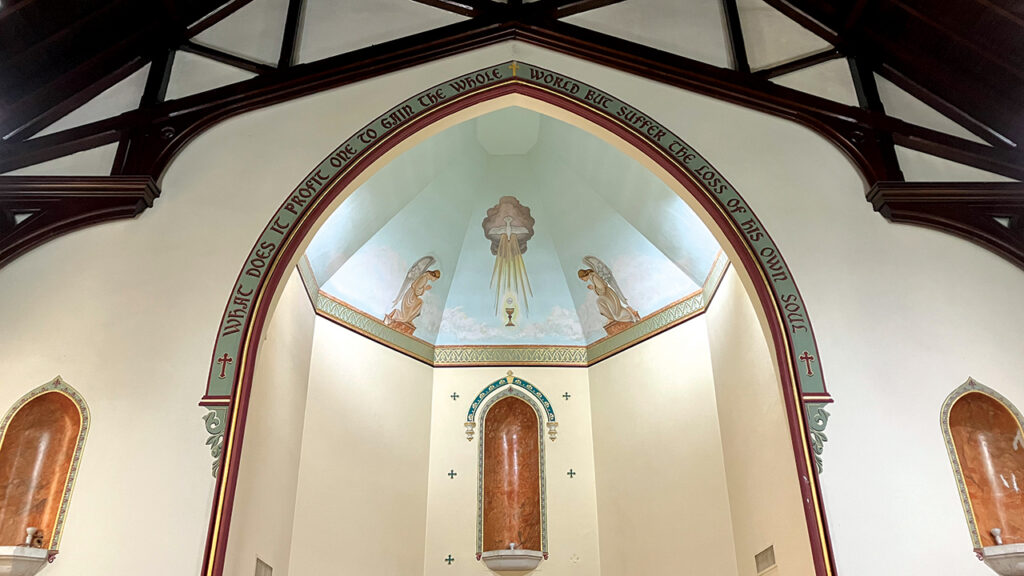 Angels venerate the eucharist at the front of the church that Hampden Mennonite Church purchased in April. —Nathan Zook