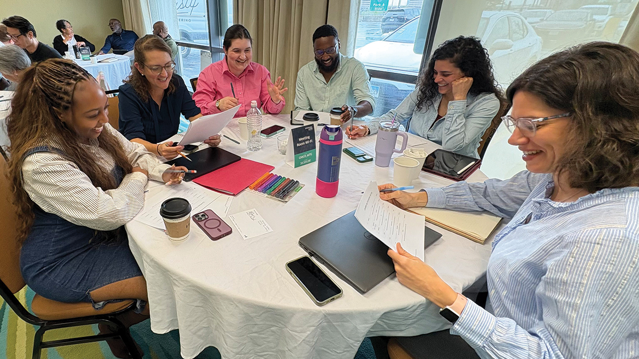 From left, Mahlet Mamo, Amy Zimbelman, Christina Manero, Jerrell Williams, Alicia Maldonado-Zahra and Amy Gingerich take part in the Mennonite Church USA Structure Review Committee meeting. — Camille Dager/MC USA
