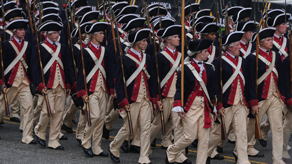 Dressed in Revolutionary War uniforms, soldiers march in a parade commemorating the U.S. Army’s 250th anniversary, June 14, 2025, in Washington. — Julia Demaree Nikhinson/AP