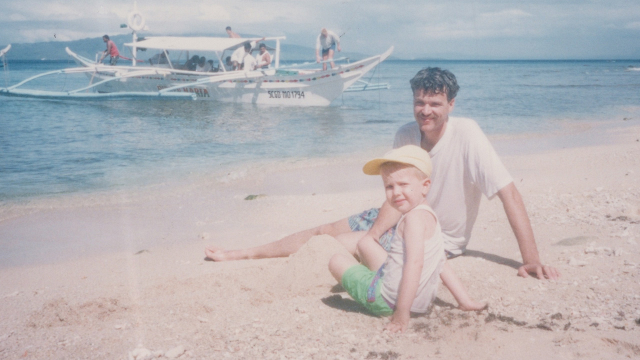 Martin Hofkamp with his dad, Mike Hofkamp, in the Philippines in 1994.