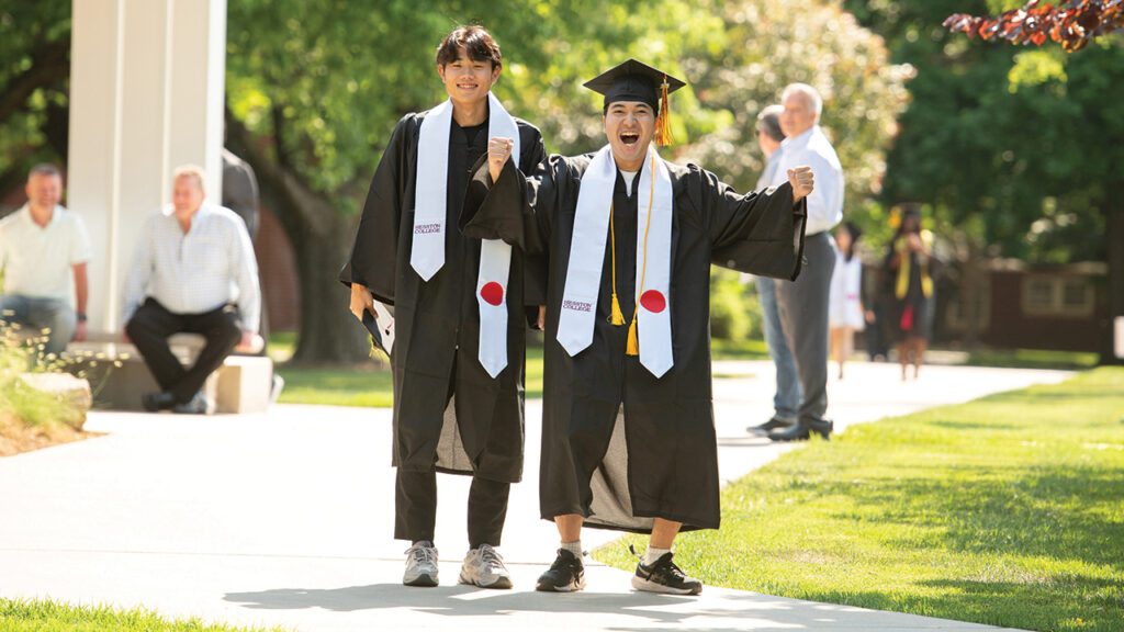 Yura Yamazaki and Makoto Suzuki celebrate at Hesston College’s 2026 commencement activities. — Larry Bartel/Hesston College