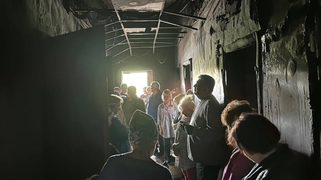Balaklia Church members inspect their gathering space the day after it was struck by Russian drones and missiles in May. No one was in the building when it was hit. — Friends of the Mennonite Centre in Ukraine