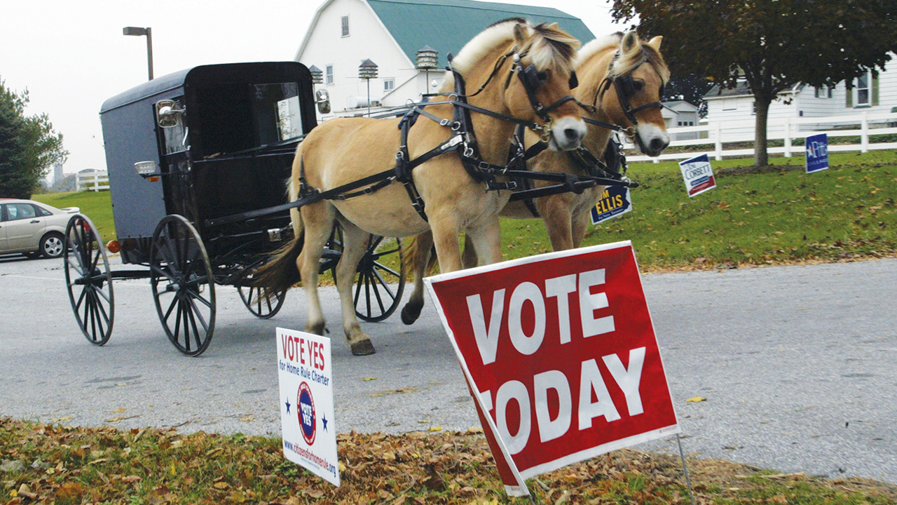 An Amish voter leaves the Leacock Township polling station after casting his ballot in Intercourse, Pa., Nov. 4, 2008. — Vinny Tennis/AP