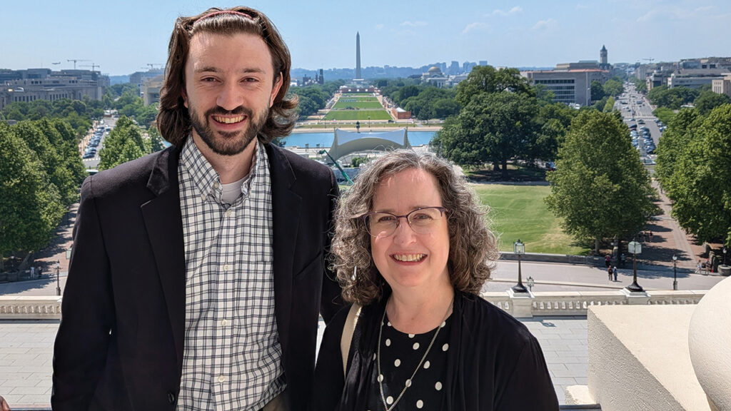 Mennonite Central Committee Washington Office staffers Galen Fitzkee and Tammy Alexander on the balcony of Speaker Mike Johnson’s office in the Capitol after a meeting with his staff during a lobby day organized by the Washington Interfaith Staff Community on May 18. — MCC Washington Office