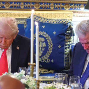 Donald Trump and Franklin Graham bow during a prayer at an Easter prayer service and dinner at the White House on April 16, 2025. — Pool via AP