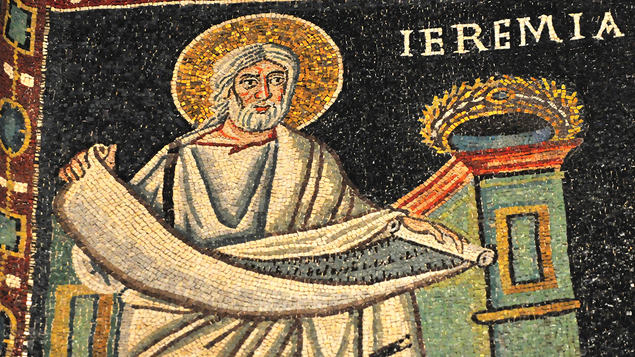 The prophet Jeremiah holding a scroll, depicted in a mosaic at the Basilica of St. Vitale in Ravenna, Italy. — Mountainpix/Shutterstock