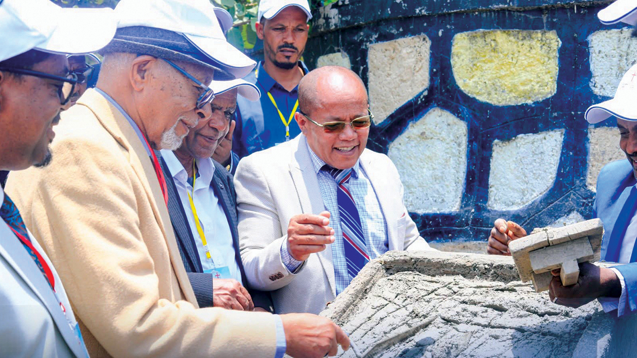 The foundation stone is laid for construction by Meserete Kristos Seminary of a five-story building during Meserete Kristos Church’s general leaders conference in Bishoftu, Ethiopia. — MKC