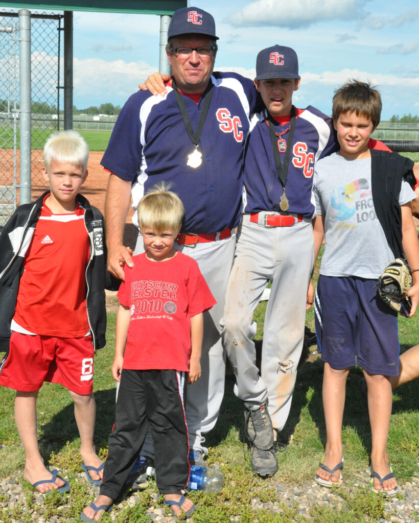 A young Tristan Peters with father Jake Peters and his three brothers. — Courtesy of Jake Peters