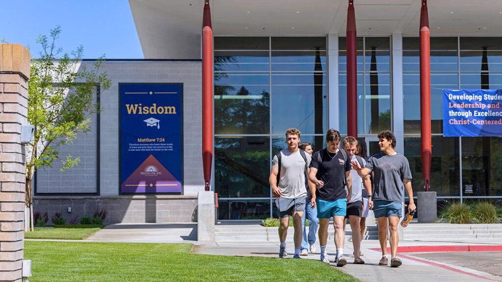 Fresno Pacific University students depart the Warkentin Culture and Arts Center. — FPU