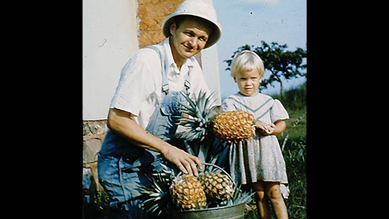 Ruth and her dad, Levi Keidel, harvesting pineapple, about 1959. — Courtesy of Ruth Keidel Clemens