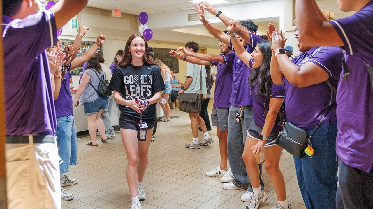 New Goshen College students are welcomed in August with an applause tunnel. — Goshen College