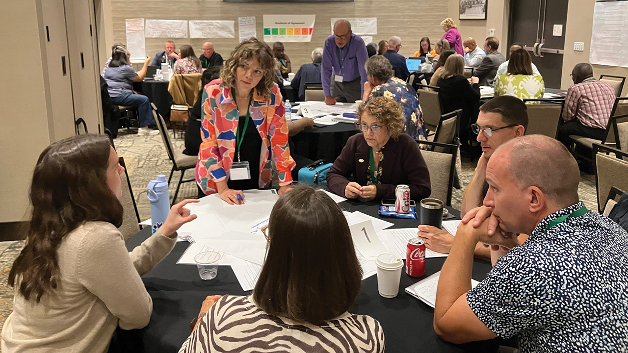 Members of three boards — Mennonite Church USA Executive Board, Mennonite Mission Network and MennoMedia — discuss denominational priorities Oct. 8 in Philadelphia. — Paul Schrag/AW