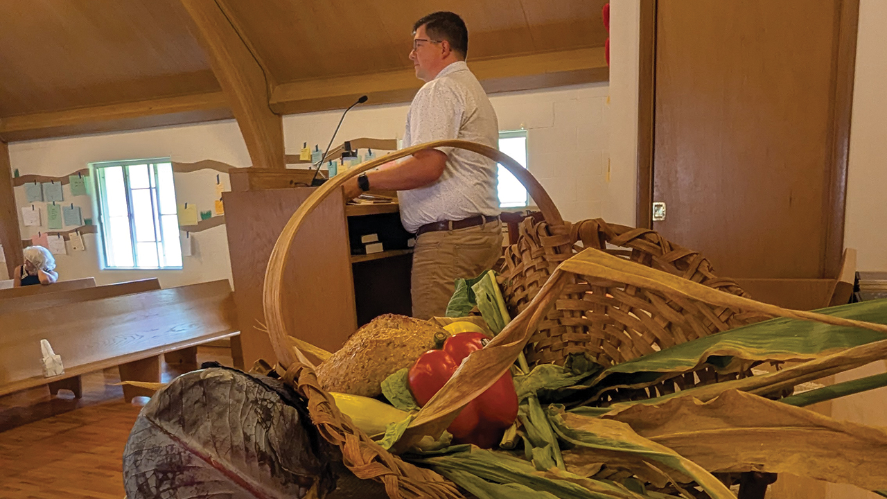 Mitch Stutzman, MennoMedia director of development and partner engagement, preaches Aug. 2 at Zion Mennonite Church in Elbing, Kan. — Tim Huber/AW